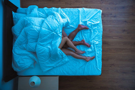Man with increased stamina playing with woman in bed