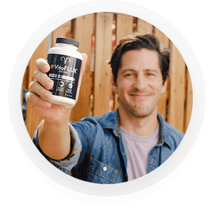 Man enjoying the benefits of VitaFLUX daily supplement from Promescent