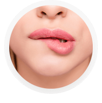Women biting lip signaling arousal from erotic massages